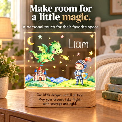 Personalized dragon and knight night light glowing on a bedside table in a cozy kids bedroom