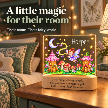 Personalized fairy garden night light glowing on a bedside table in a cozy kids bedroom