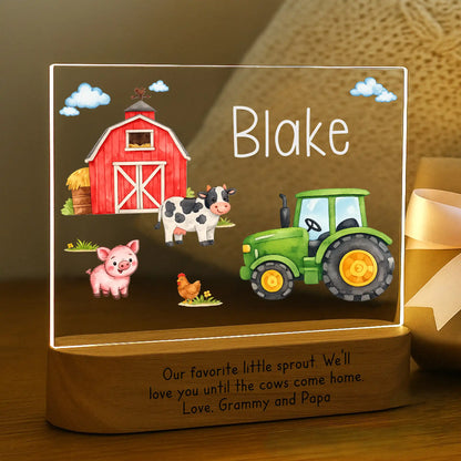Personalized farm night light glowing with custom name Blake laser engraved on acrylic and Our Favorite Little Sprout message laser engraved on acacia wood base