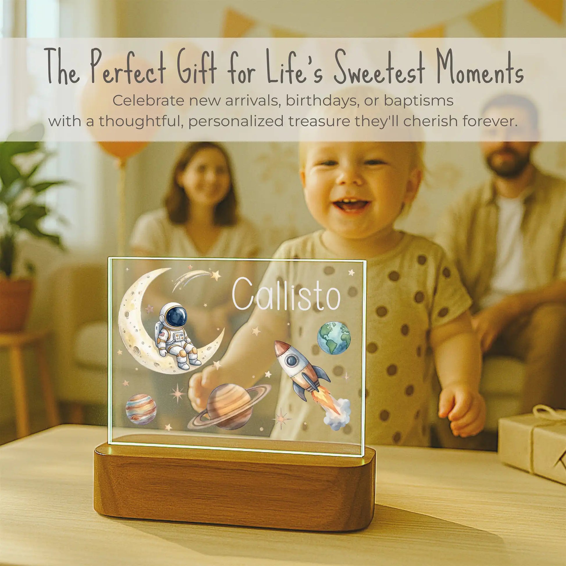Watercolor space design detail on personalized night light featuring astronaut, rocket with flame trail, planets, and shooting stars