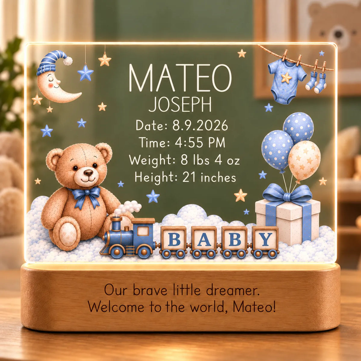 Personalized baby boy night light with birth stats, blue teddy bear, toy train and BABY block artwork, and engraved message on an acacia wood LED base