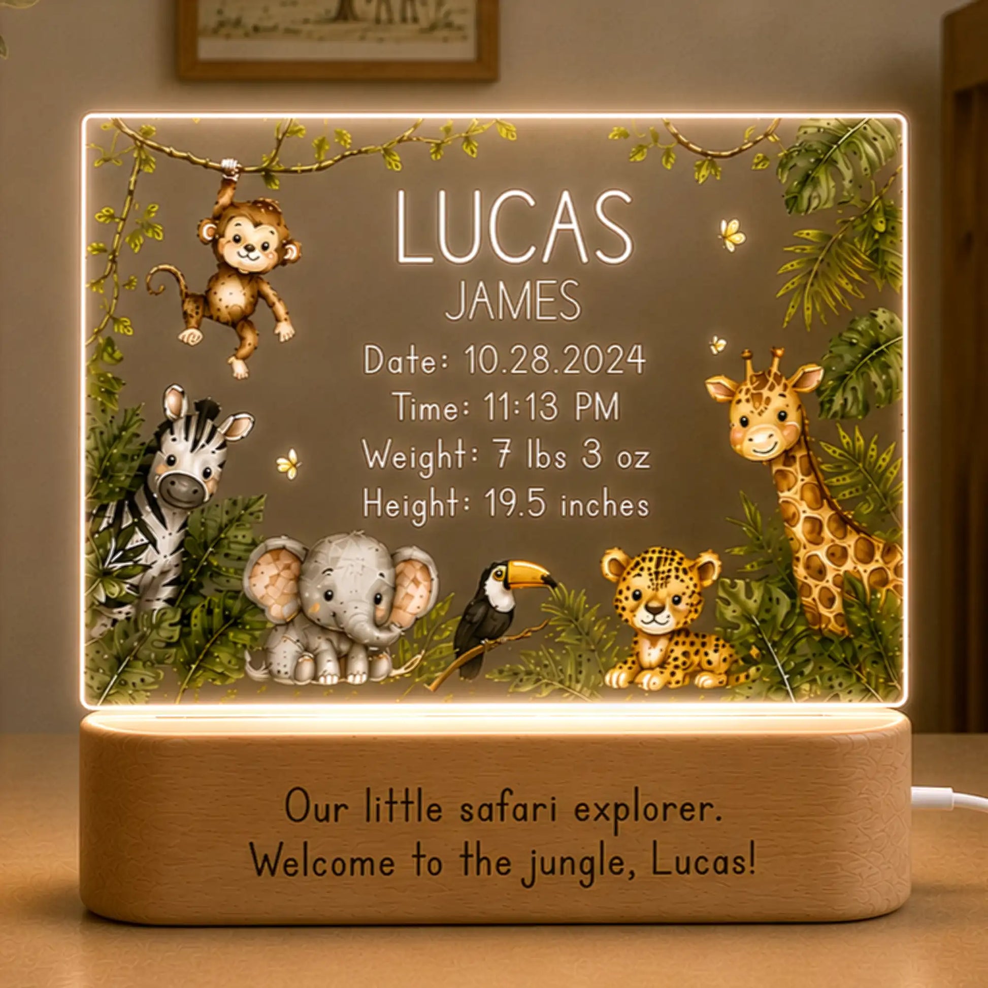 Personalized jungle baby night light with elephant and giraffe design and laser engraved name and birth stats on clear acrylic