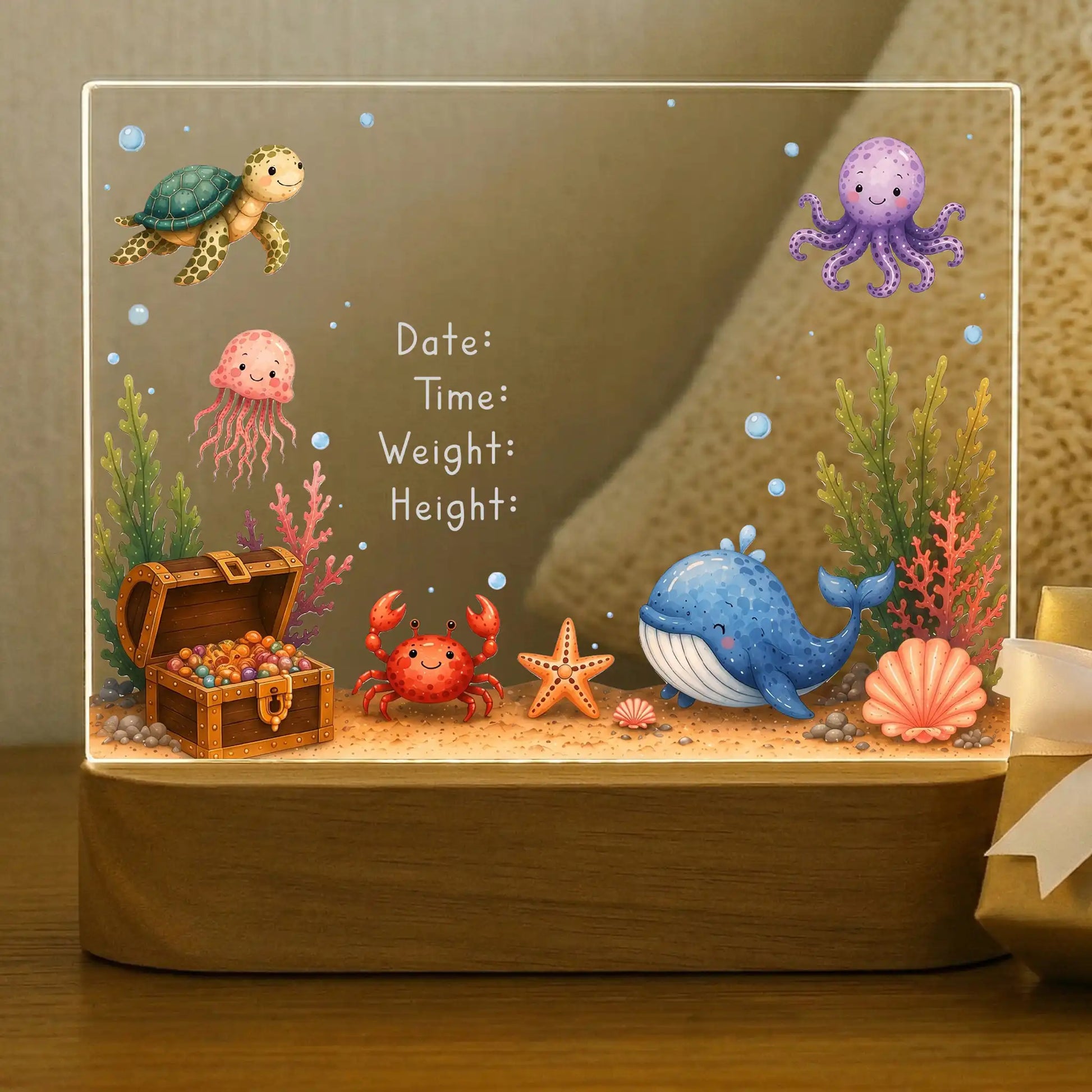 Ocean baby night light shown before name and birth stats are engraved