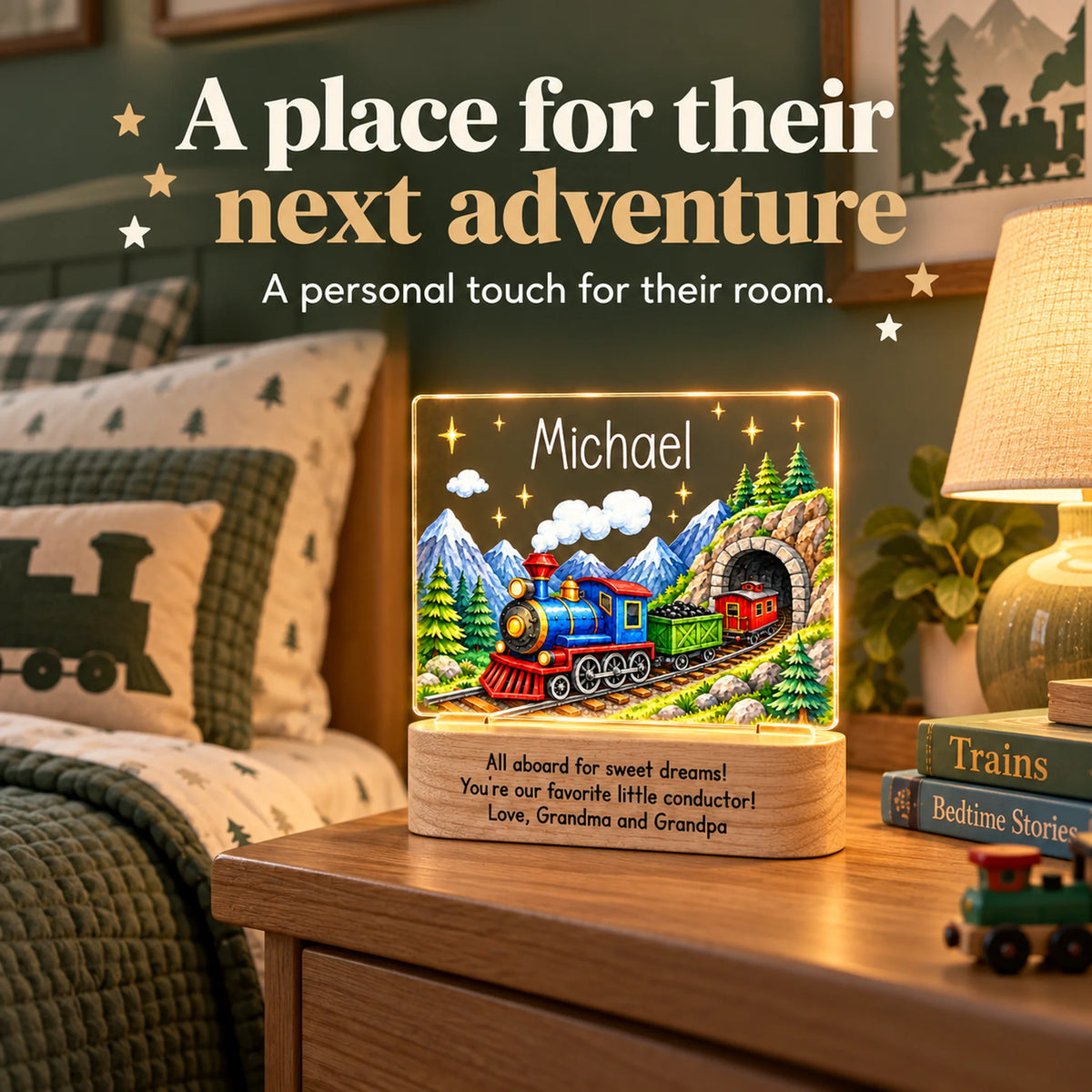 Personalized train night light glowing on a nightstand in a train-themed kids bedroom