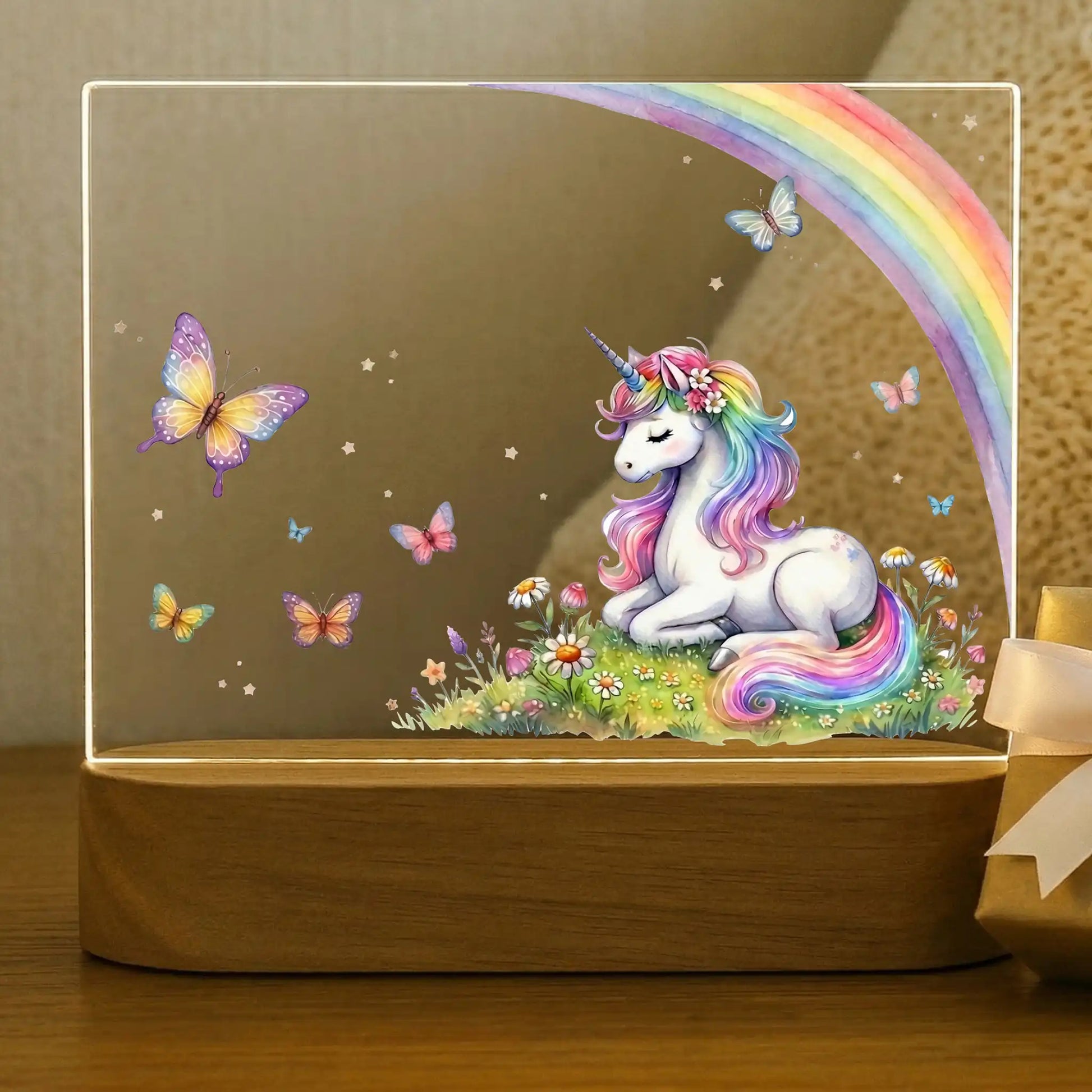 Blank personalized unicorn night light acrylic plate with UV printed rainbow-maned unicorn resting in flower field with full rainbow and colorful butterflies, girls room decor