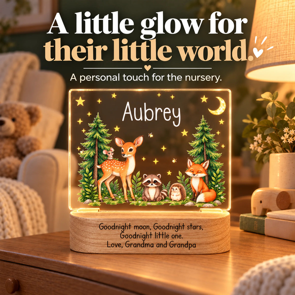 Personalized woodland animals night light glowing on a dresser in a cozy nursery