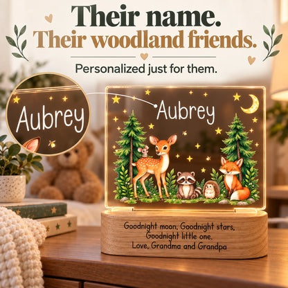 Personalized woodland night light with a close-up of the child's name above the deer, fox and raccoon