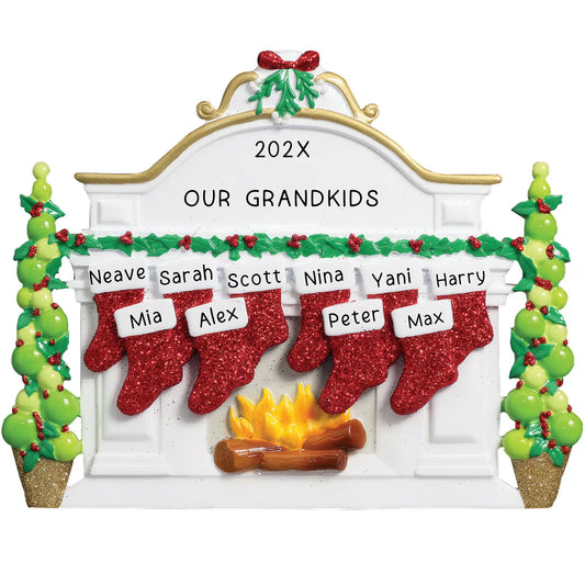 Personalized family of 10 Christmas ornament with white and gold fireplace mantle, six red glitter stockings, crackling fire and topiary trees, customizable with names and yearRetry