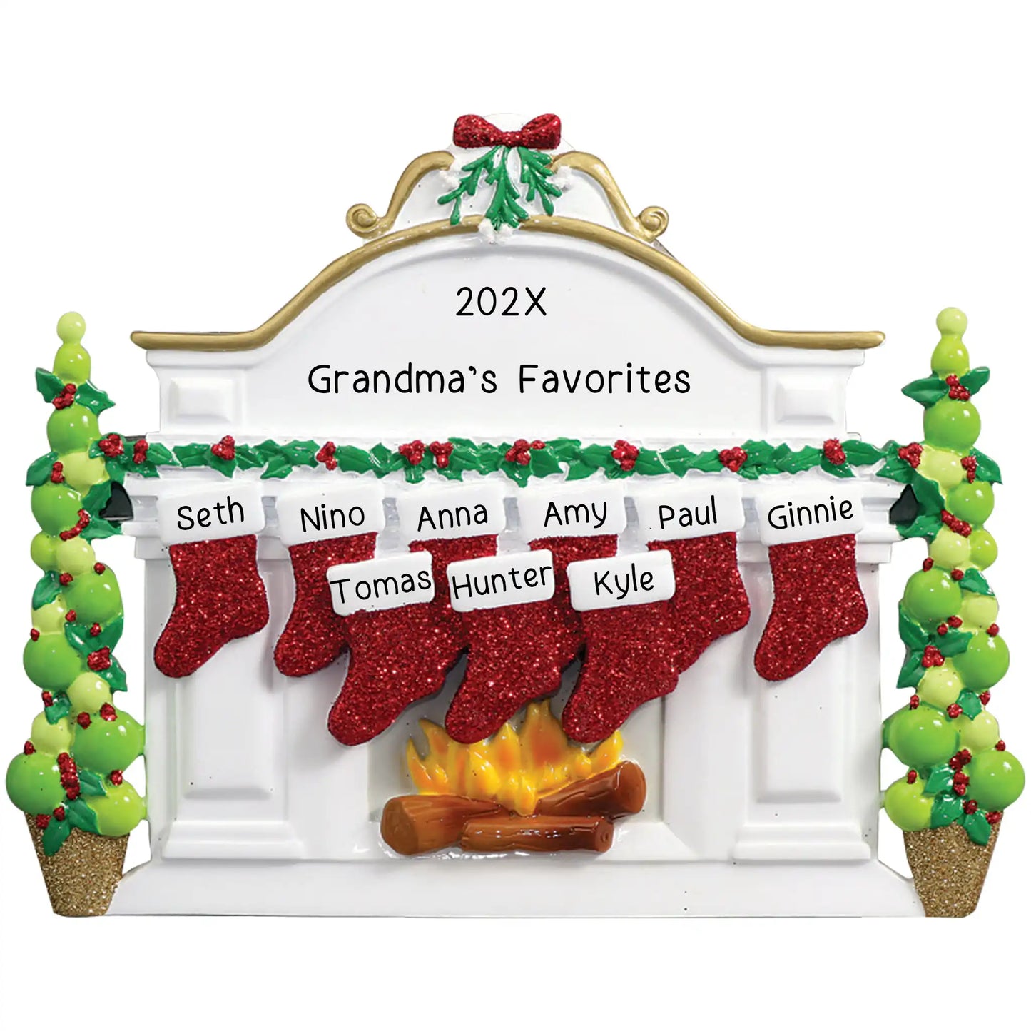 Personalized Christmas ornament featuring a white fireplace mantle with red glitter stockings and topiary trees, ready for up to nine custom name engravings.