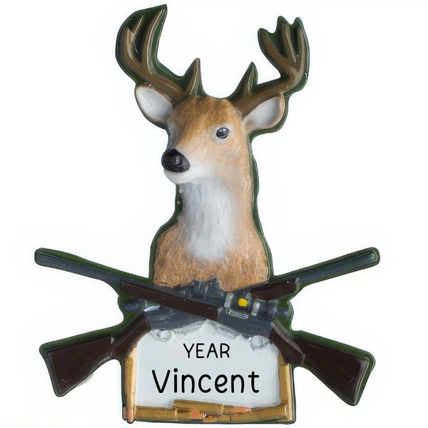 Personalized Christmas ornament featuring a buck's head and antlers above two crossed rifles, with a blank white shield ready for custom name and year engraving.