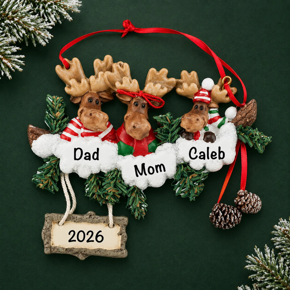 Personalized moose family of 3 christmas ornament on a dark green pine background