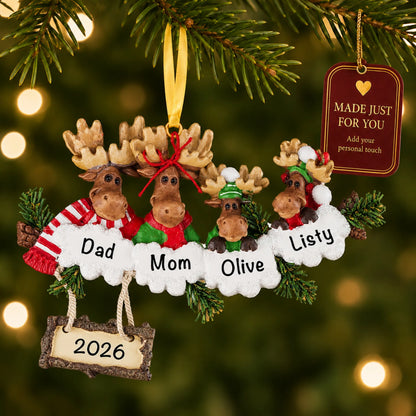 Moose family of 4 christmas ornament hanging on a lit Christmas tree with a Made Just For You gift tag