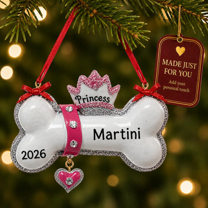 Princess Dog Bone christmas ornament hanging on a lit Christmas tree with a Made Just For You gift tag