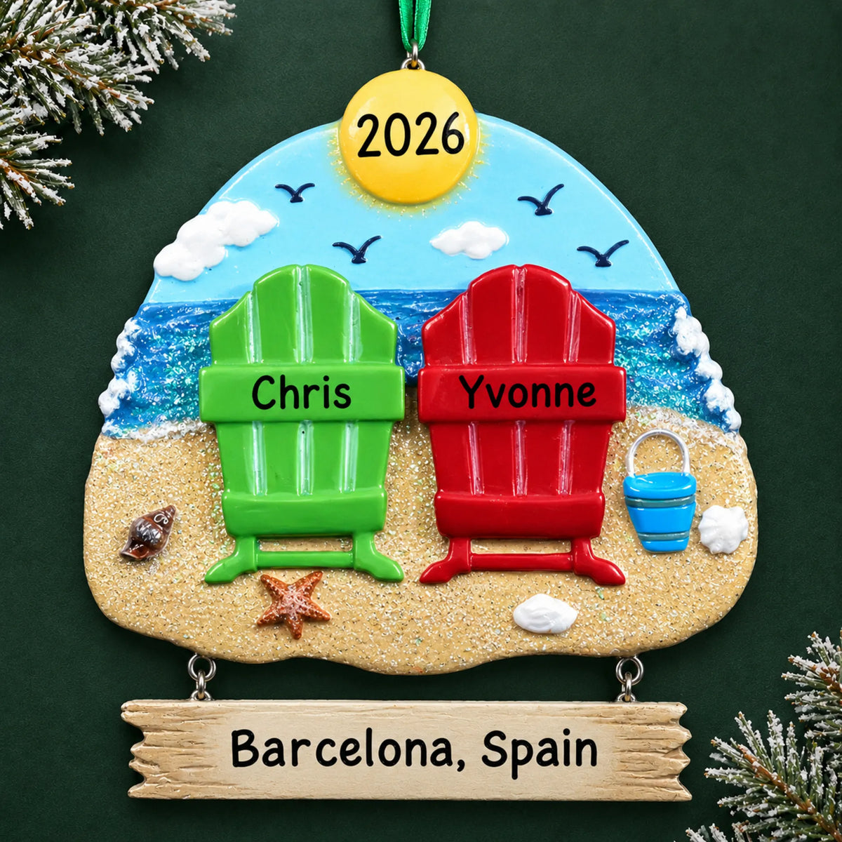 Personalized beach chair couple christmas ornament on a dark green pine background