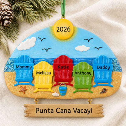 Personalized beach family of 5 christmas ornament laid on a soft white knit blanket