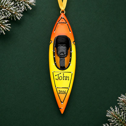 Personalized 3D kayak christmas ornament on a dark green pine background