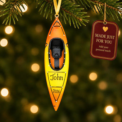3D kayak christmas ornament hanging on a lit Christmas tree with a Made Just For You gift tag