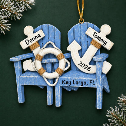 Personalized nautical adirondack chairs christmas ornament on a dark green pine background