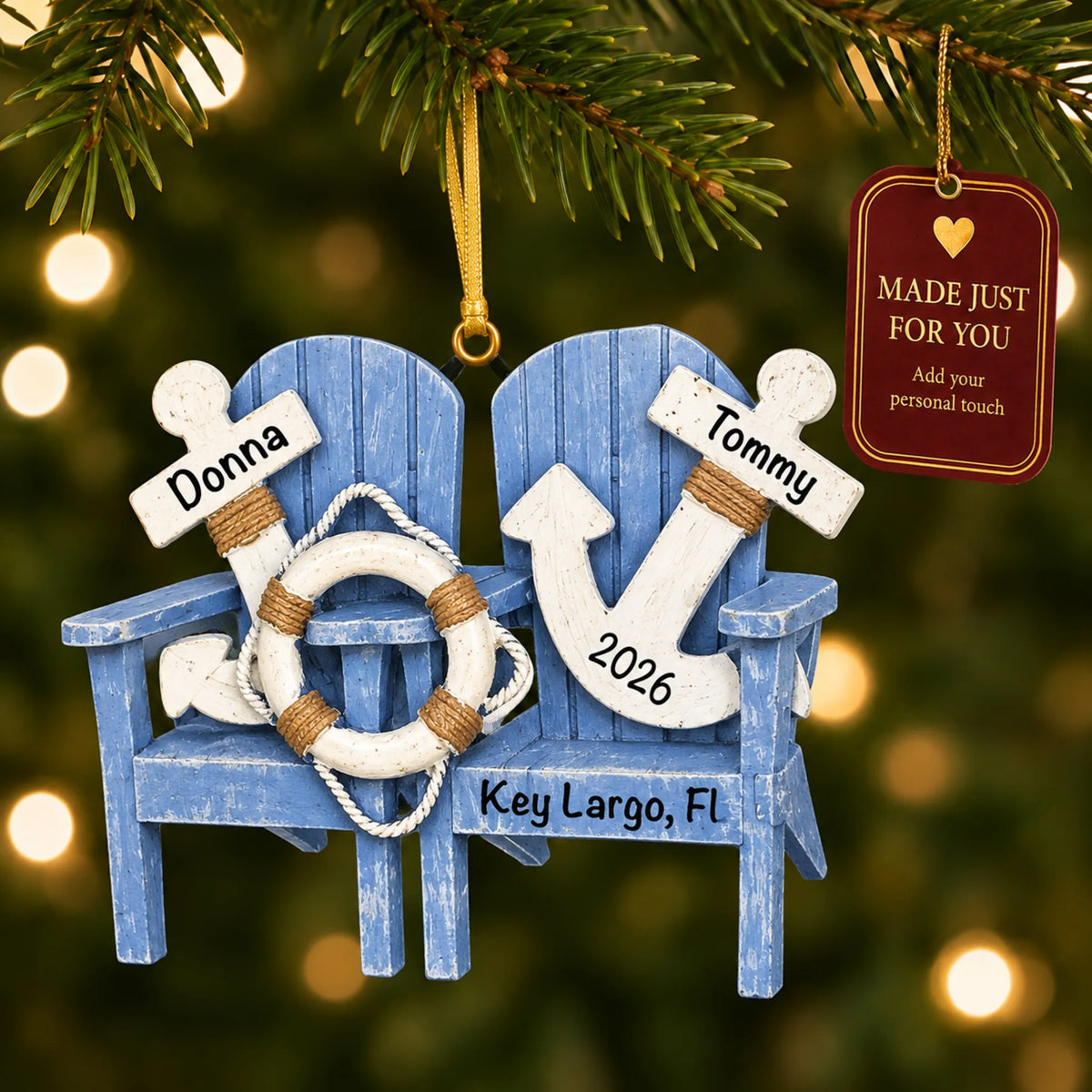 Nautical adirondack chairs christmas ornament hanging on a lit Christmas tree with a Made Just For You gift tag