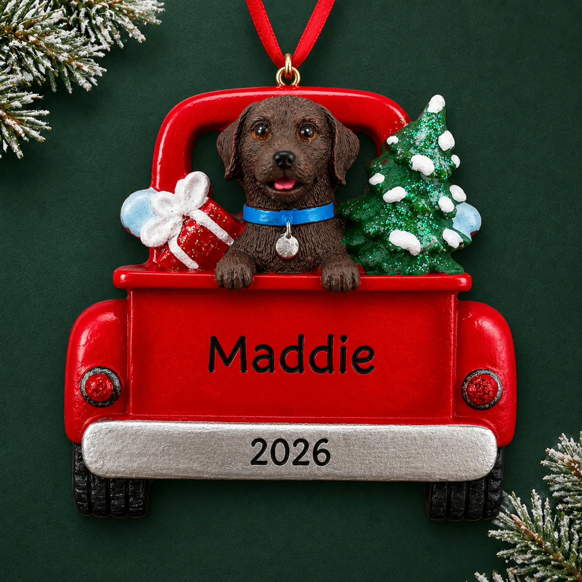 Personalized Chocolate Lab Vintage Truck christmas ornament on a dark green pine background