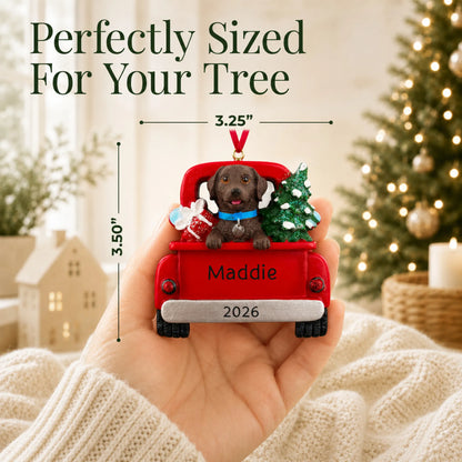Size guide: the personalized Chocolate Lab Vintage Truck christmas ornament is 3.25 in wide by 3.50 in tall, shown in hand