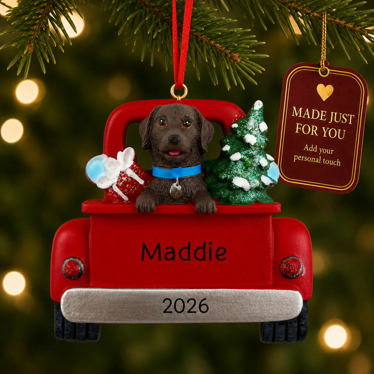 Chocolate Lab Vintage Truck christmas ornament hanging on a lit Christmas tree with a Made Just For You gift tag