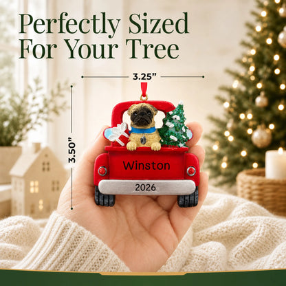 Size guide: the personalized Pug Vintage Truck christmas ornament is 3.25 in wide by 3.50 in tall, shown in hand