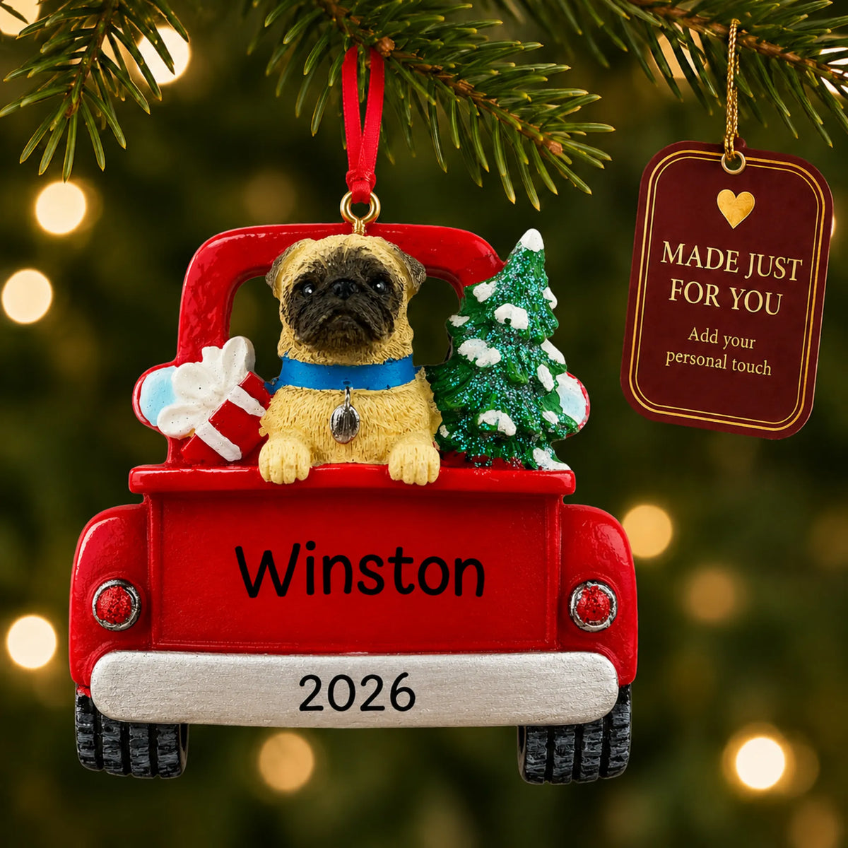 Pug Vintage Truck christmas ornament hanging on a lit Christmas tree with a Made Just For You gift tag
