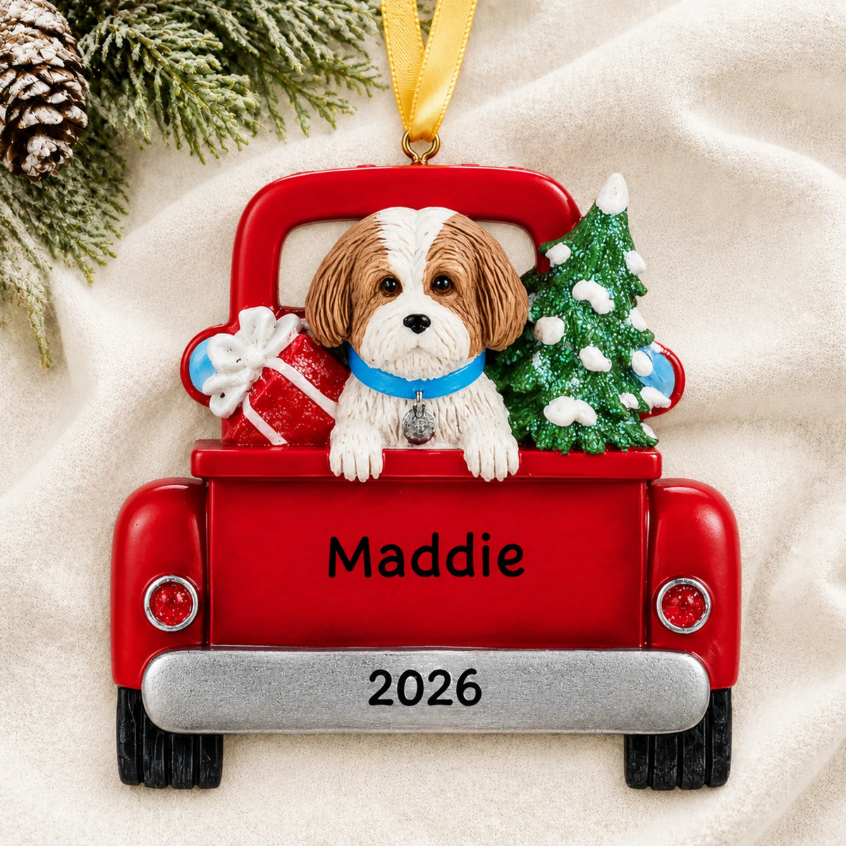 Personalized Tan Shih Tzu Vintage Truck christmas ornament laid on a soft white knit blanket
