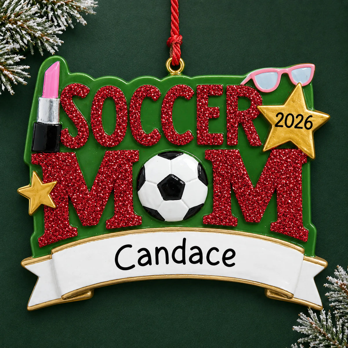 Personalized soccer mom christmas ornament on a dark green pine background