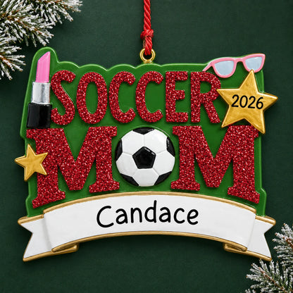 Personalized soccer mom christmas ornament on a dark green pine background