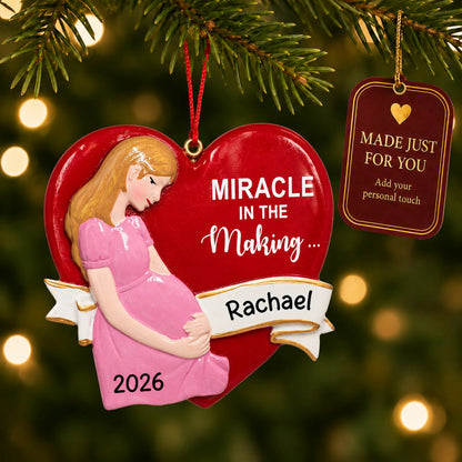 Expecting Mom christmas ornament hanging on a lit Christmas tree with a Made Just For You gift tag
