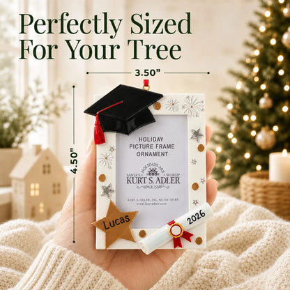 Size guide: the personalized Graduation Photo Frame christmas ornament is 3.50 in wide by 4.50 in tall, shown in hand