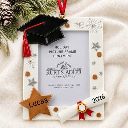 Personalized Graduation Photo Frame christmas ornament laid on a soft white knit blanket