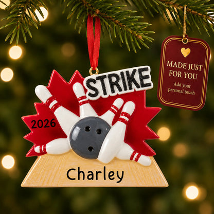 Bowling strike christmas ornament hanging on a lit Christmas tree with a Made Just For You gift tag