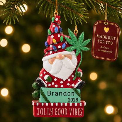 Cannabis santa gnome christmas ornament hanging on a lit Christmas tree with a Made Just For You gift tag