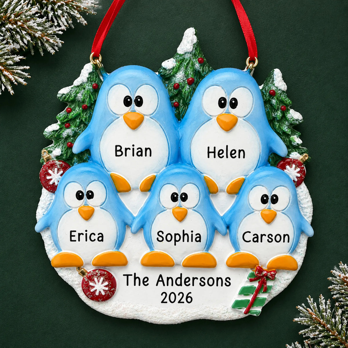 Personalized penguin family of 5 christmas ornament on a dark green pine background