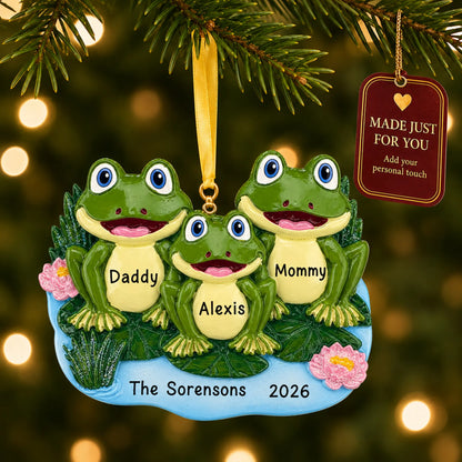 Frog family of 3 christmas ornament hanging on a lit Christmas tree with a Made Just For You gift tag