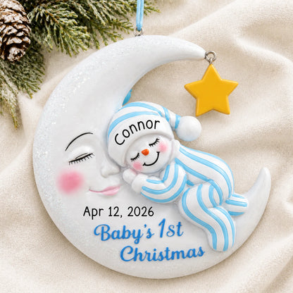 Personalized blue snowman baby's 1st christmas ornament laid on a soft white knit blanket