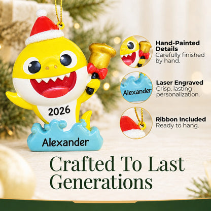 Hand-painted details and laser engraved personalization on the Baby Shark Santa Hat christmas ornament, ribbon included