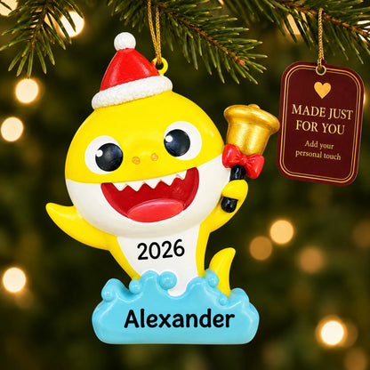 Baby Shark Santa Hat christmas ornament hanging on a lit Christmas tree with a Made Just For You gift tag