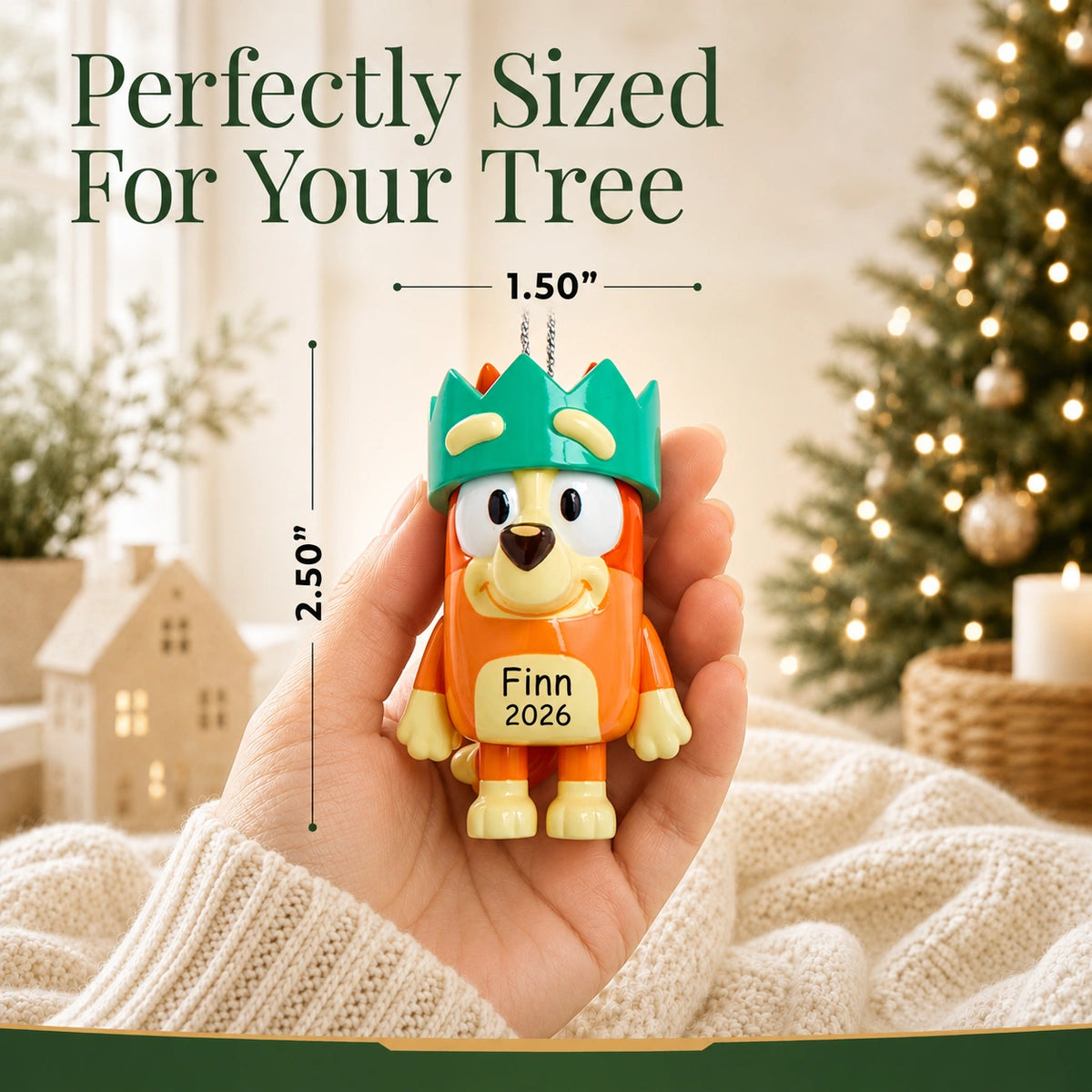 Personalized Bingo with crown Christmas ornament held in hand to show size, about 1.5 inches wide by 2.5 inches tall