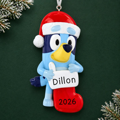 Personalized Bluey Stocking christmas ornament on a dark green pine background