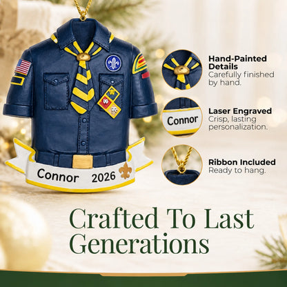 Hand-painted details and laser engraved personalization on the Cub Scout Boy Scouts christmas ornament, ribbon included