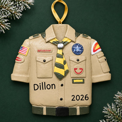 Personalized Boy Scouts uniform christmas ornament on a dark green pine background
