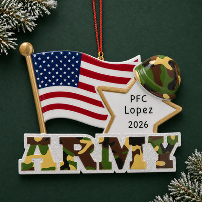 Personalized Army American flag Christmas ornament with name and year, shown on a green holiday background