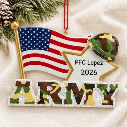 Personalized Army American flag Christmas ornament shown on a soft white blanket