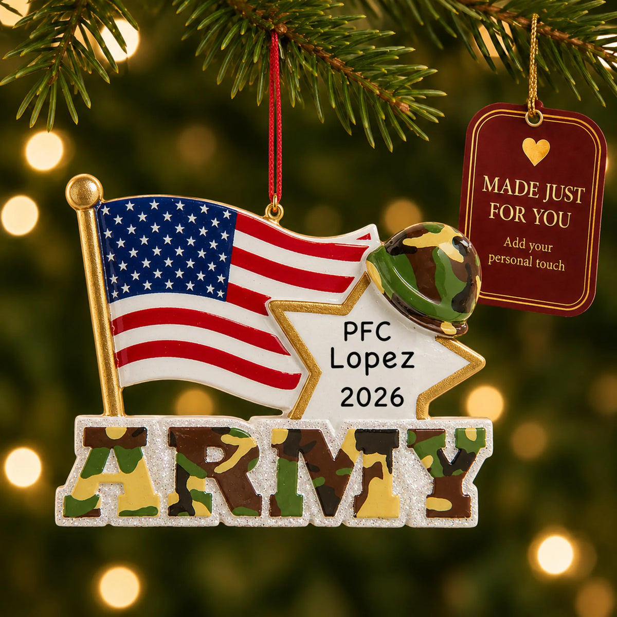 Personalized Army American flag Christmas ornament hanging among tree lights with a Made Just For You tag