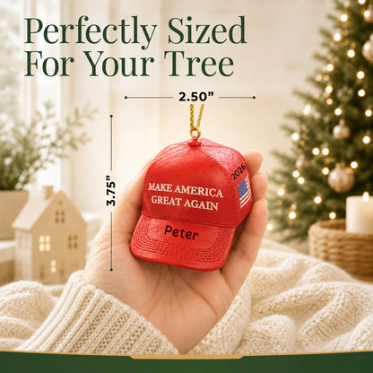 Personalized MAGA hat Christmas ornament held in hand to show its size on the tree