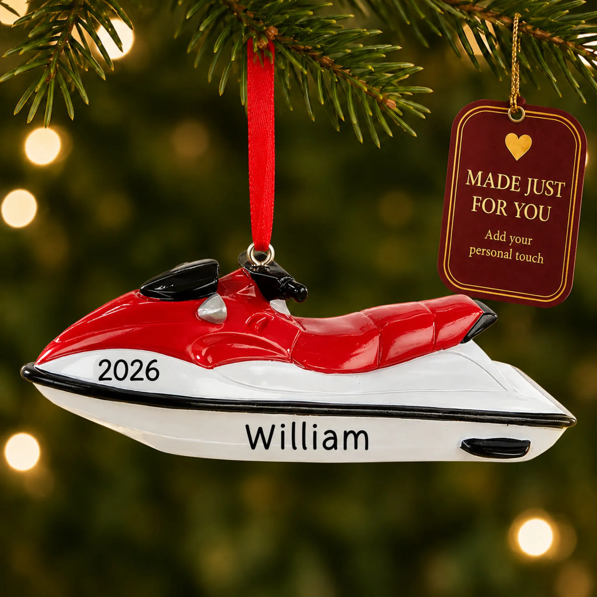 3D jet ski christmas ornament hanging on a lit Christmas tree with a Made Just For You gift tag